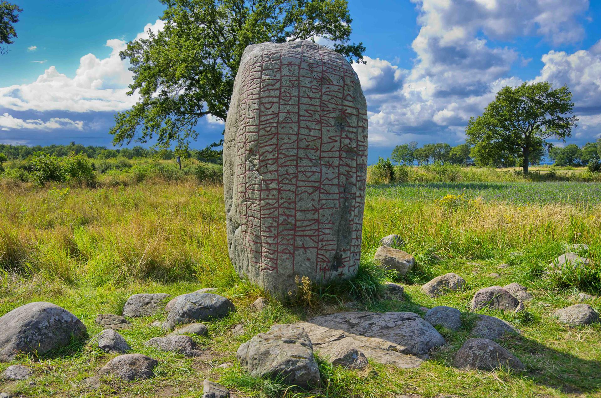 Ancient Viking runestones carved with runic inscriptions showing Old Norse writing