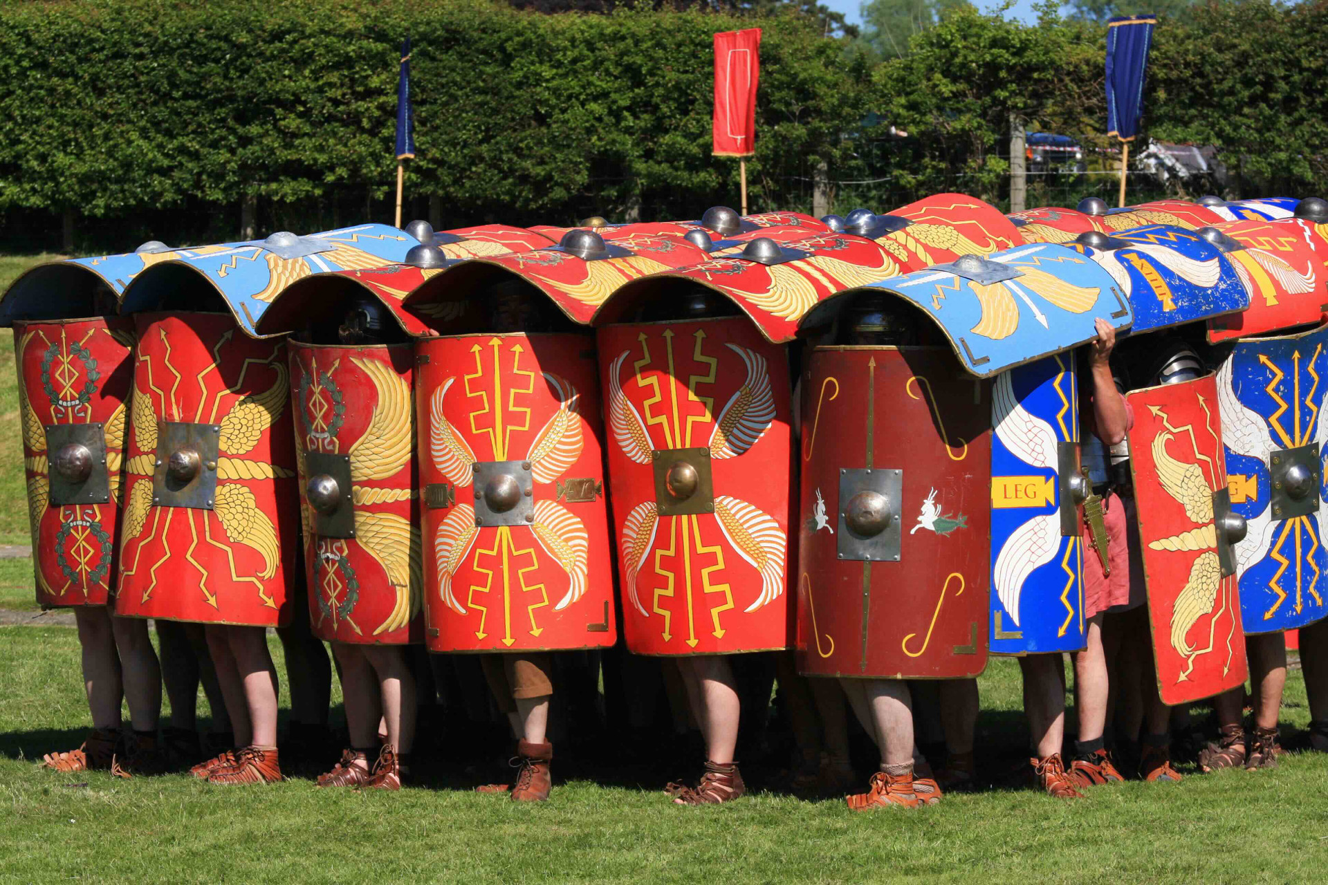 Child-friendly illustration of Roman soldiers in formation with shields and spears, showing the powerful Roman legions in an educational scene for young history learners